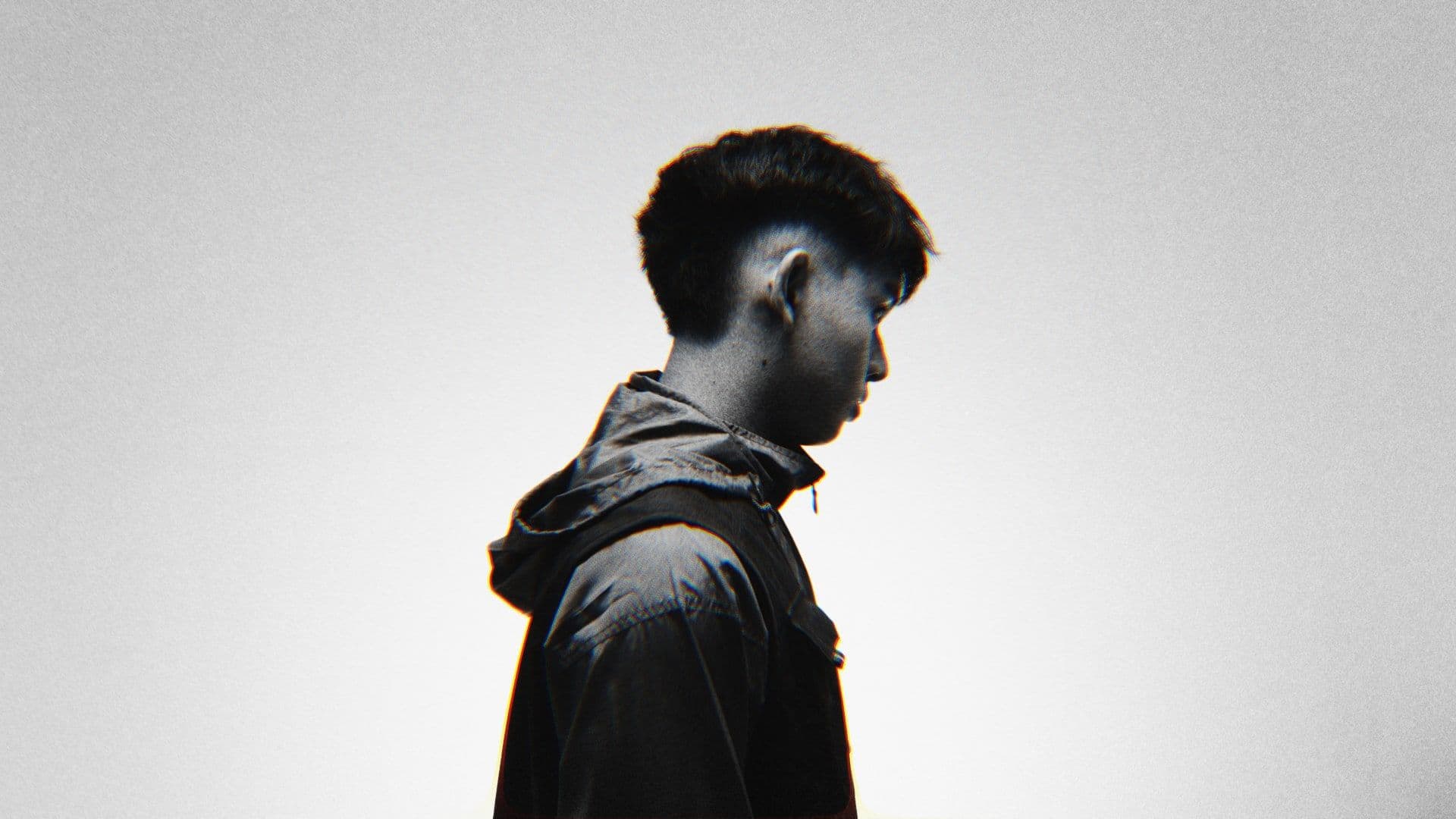 Profile against a white wall